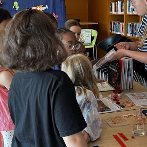 Children observing at different stalls